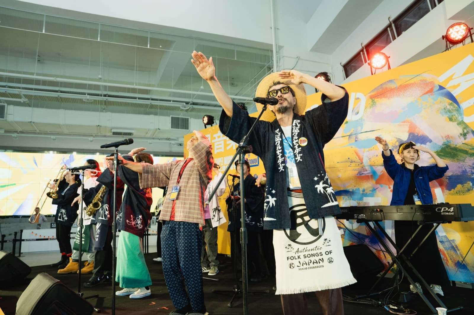 Minyo Crusaders performing at the press conference