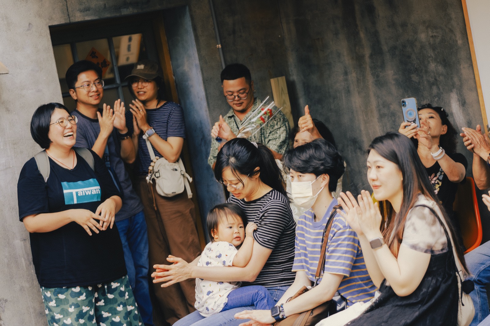 Neighbours joining the open community show at the Beidou bookstore, Changhua